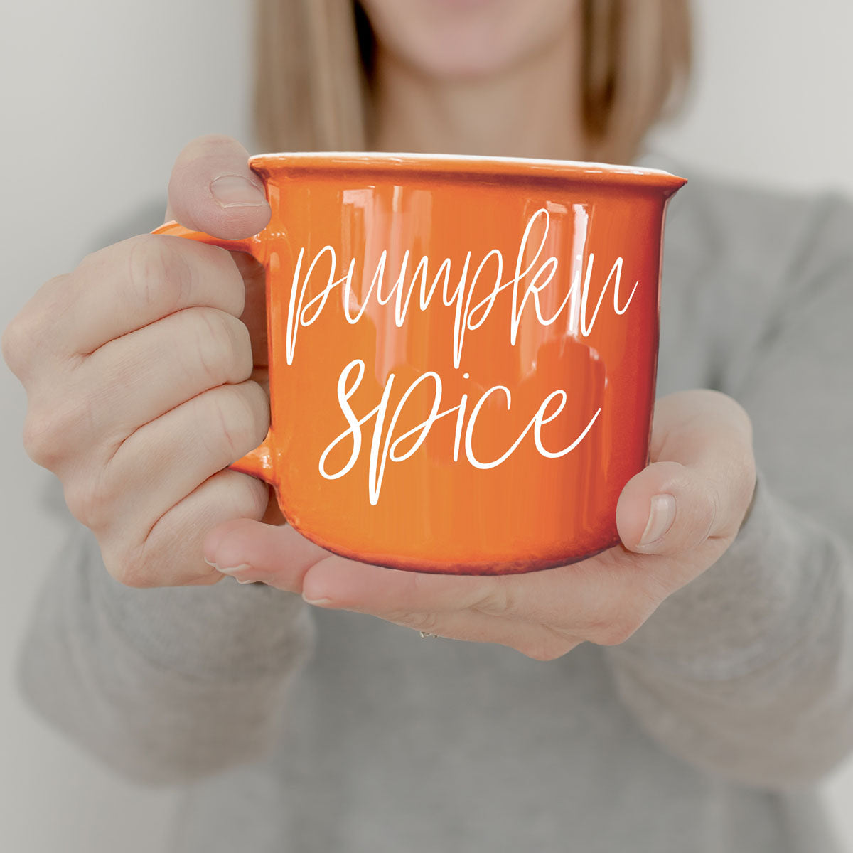 cozy rainy day window scene with mug and book
autumn baking day with mug and cookies
fall holiday morning coffee in bright orange mug
seasonal home decor flatlay with mug and leaves