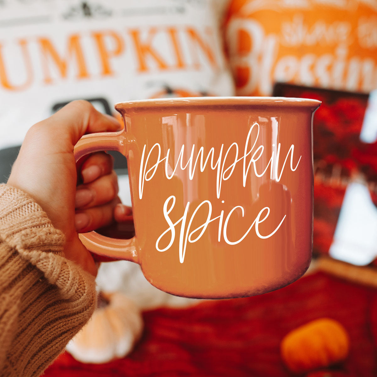 fall inspired coffee cup in rustic farmhouse kitchen
orange ceramic mug for october mornings
autumn shelf decor featuring bright orange mug
fall themed coffee station with seasonal mugs
cozy fall evening setup with mug and candle