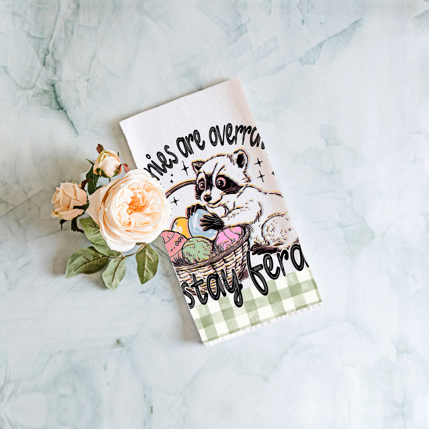 Humorous raccoon towel Easter basket stay feral farmhouse
Funny saying Easter dish towel raccoon humor gingham
Sarcastic raccoon kitchen towel bunnies overrated Easter
Witty Easter towel funny raccoon eggs farmhouse spring