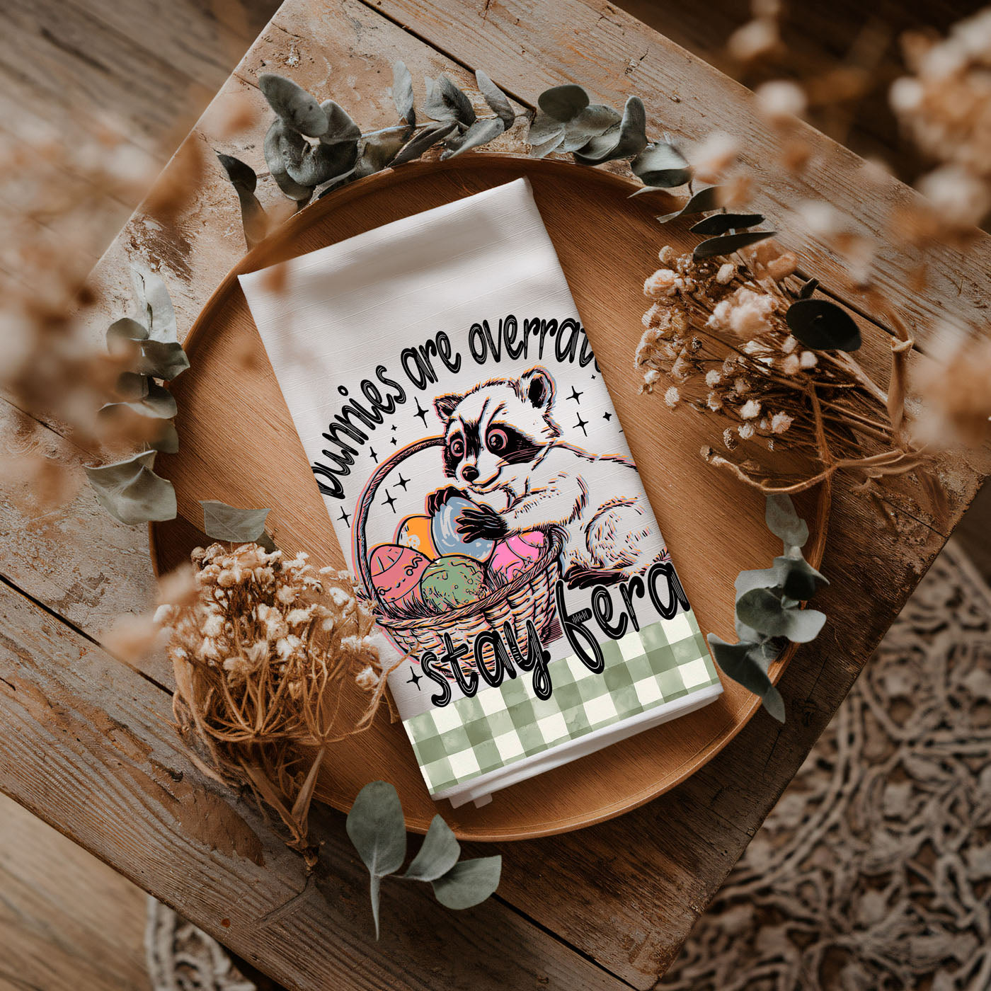 Clever Easter dish towel raccoon basket humor gingham
Humorous raccoon kitchen towel Easter eggs funny
Funny text Easter towel raccoon bunnies overrated
Sarcastic raccoon dish towel stay feral farmhouse
Witty Easter kitchen towel funny raccoon eggs gingham