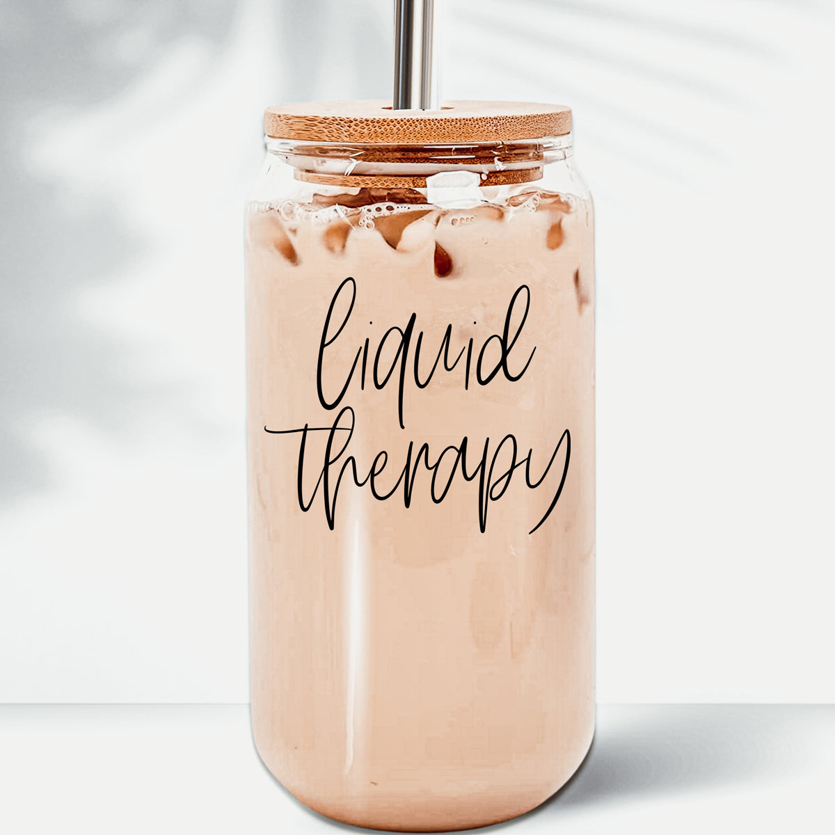 Glass cup that reads liquid therapy in black, Glass mug with wooden lid and straw