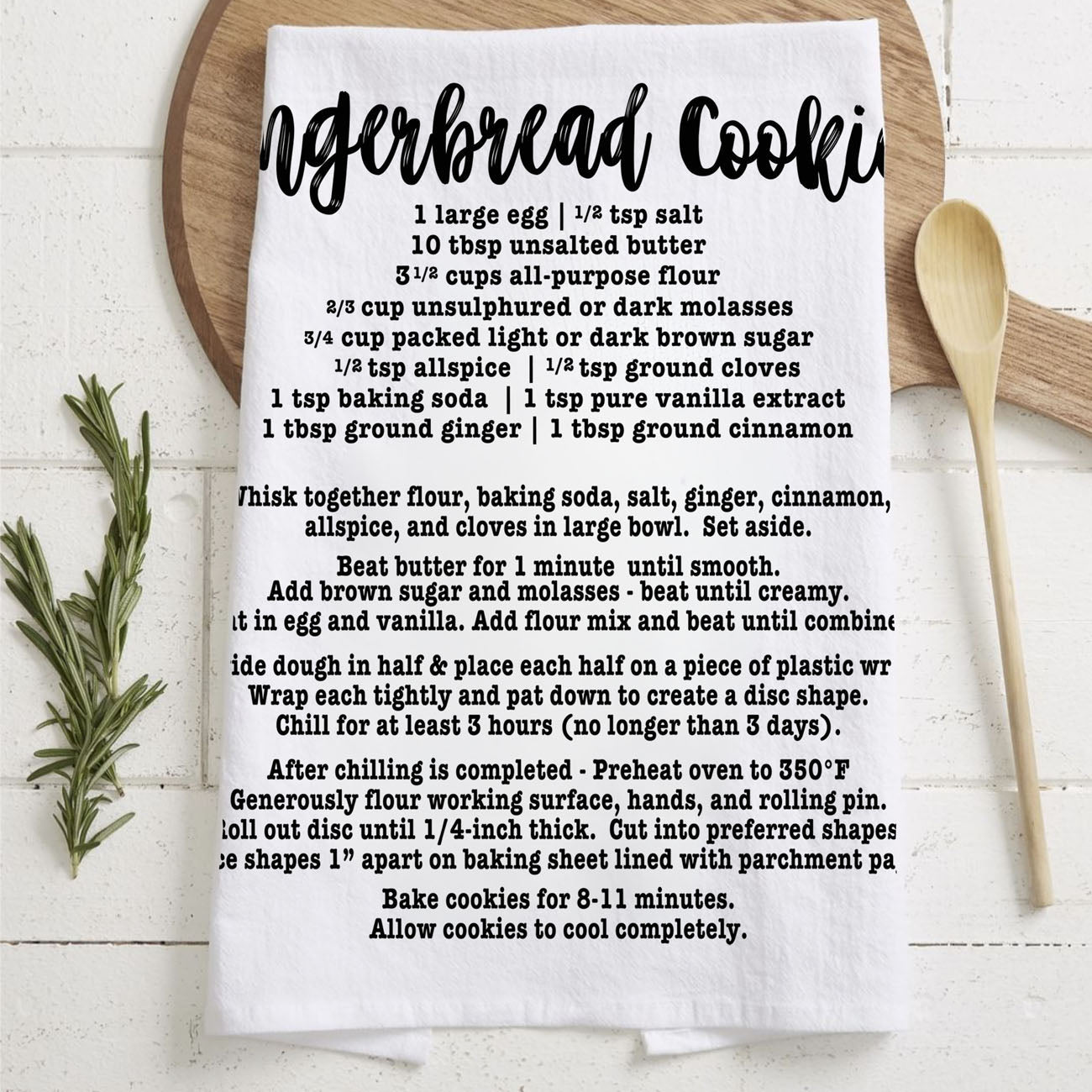 decorative baking towel christmas recipe print
christmas towel with recipe for homemade cookies
kitchen towel that shows gingerbread recipe steps
holiday dish towel with baking recipe design
recipe towel for christmas cookie baking decor