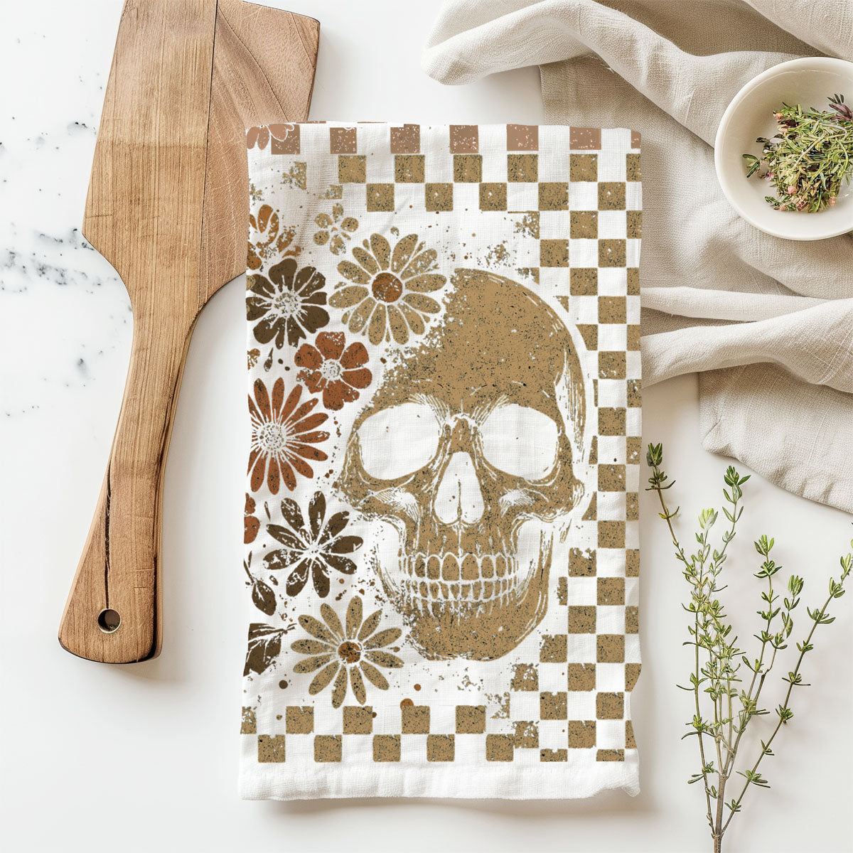 brown checkered ghost towel for farmhouse halloween kitchen
retro skull kitchen towel with daisy flowers and checks
neutral halloween hand towel with retro ghost illustration