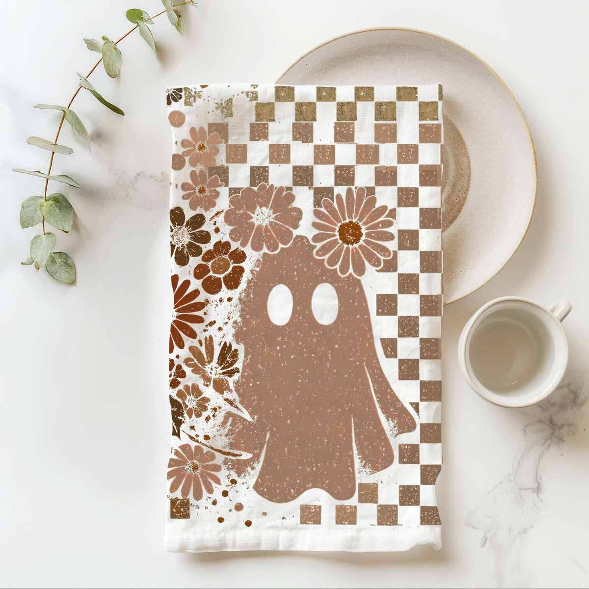 brown floral skull towel for gothic farmhouse fall décor
ghost and skull checkered towel for halloween hostess gift
neutral halloween kitchen décor towel with retro pattern