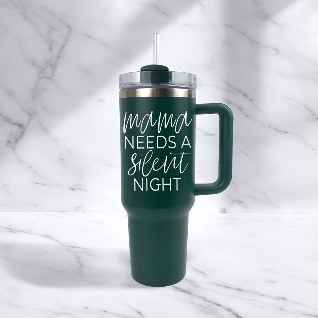 dark green tumbler with straw
