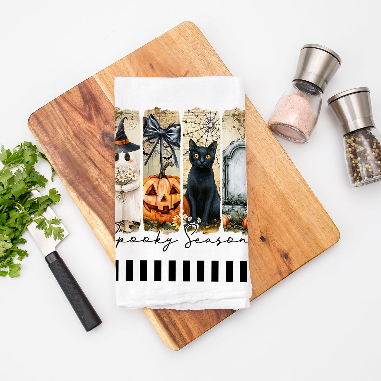 modern spooky art towel for chic halloween decorating
black cat and gravestone towel for haunted house décor
spooky season hand towel for bathroom or powder room
cute halloween ghost towel for entryway ladder styling