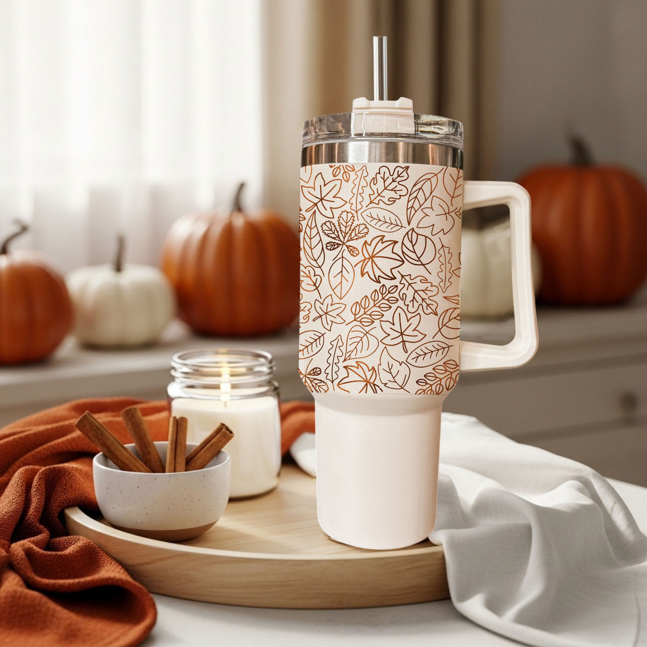 Stay cozy all season long with this stylish 40oz fall tumbler featuring a neutral autumn leaf pattern and convenient handled design. Perfect for iced coffee, water, tea, or your favorite seasonal drinks, this insulated travel tumbler keeps beverages hot or cold for hours.