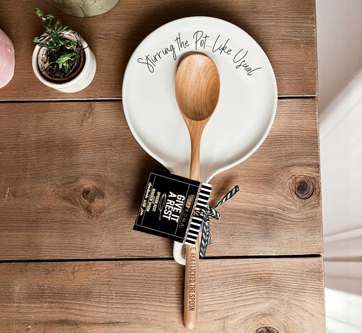 Durable porcelain spoon rest with non-slip base and wooden spoon
Kitchen counter organizer with funny cooking quote