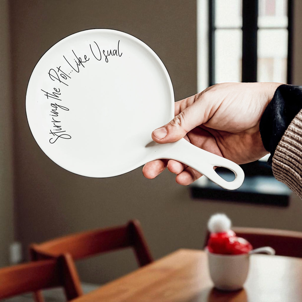 Minimalist kitchen decor with black and white spoon rest options
Styled kitchen counter with sassy spoon rest and cooking accessories