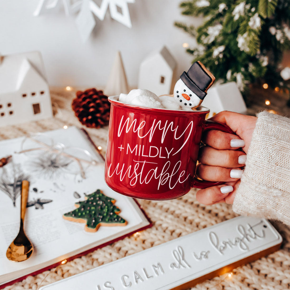 A hilarious Merry + Mildly Unstable Christmas mug for anyone surviving the holidays with caffeine and sarcasm. Great funny Christmas gift for moms, friends & coworkers
Celebrate festive chaos with this funny Christmas coffee cup. Perfect holiday mug for cocoa, coffee bars, Christmas gifts, White Elephant exchanges & cozy winter mornings
merry and mildly unstable Christmas mug
merry + mildly unstable coffee cup