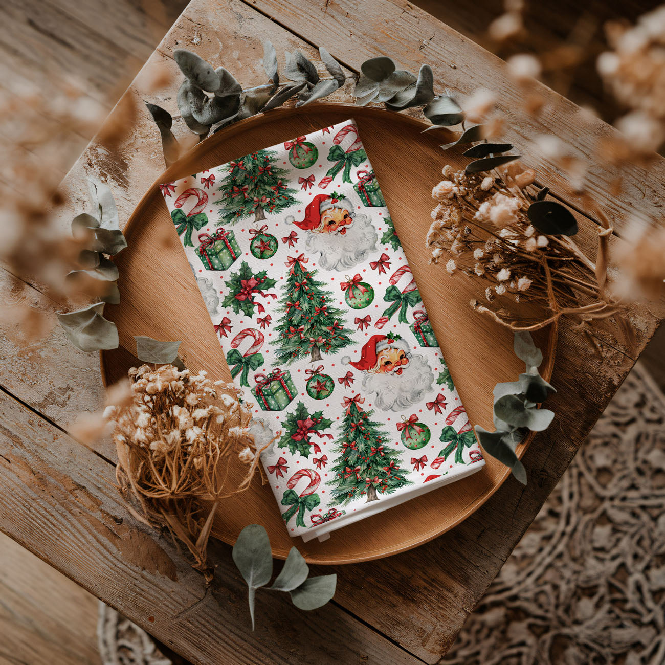 festive dish towel with ornaments trees and santa pattern
christmas towel detailed holiday icons seasonal decor
holiday kitchen towel with christmas greenery and gifts
festive towel with red bows candy canes and ornaments