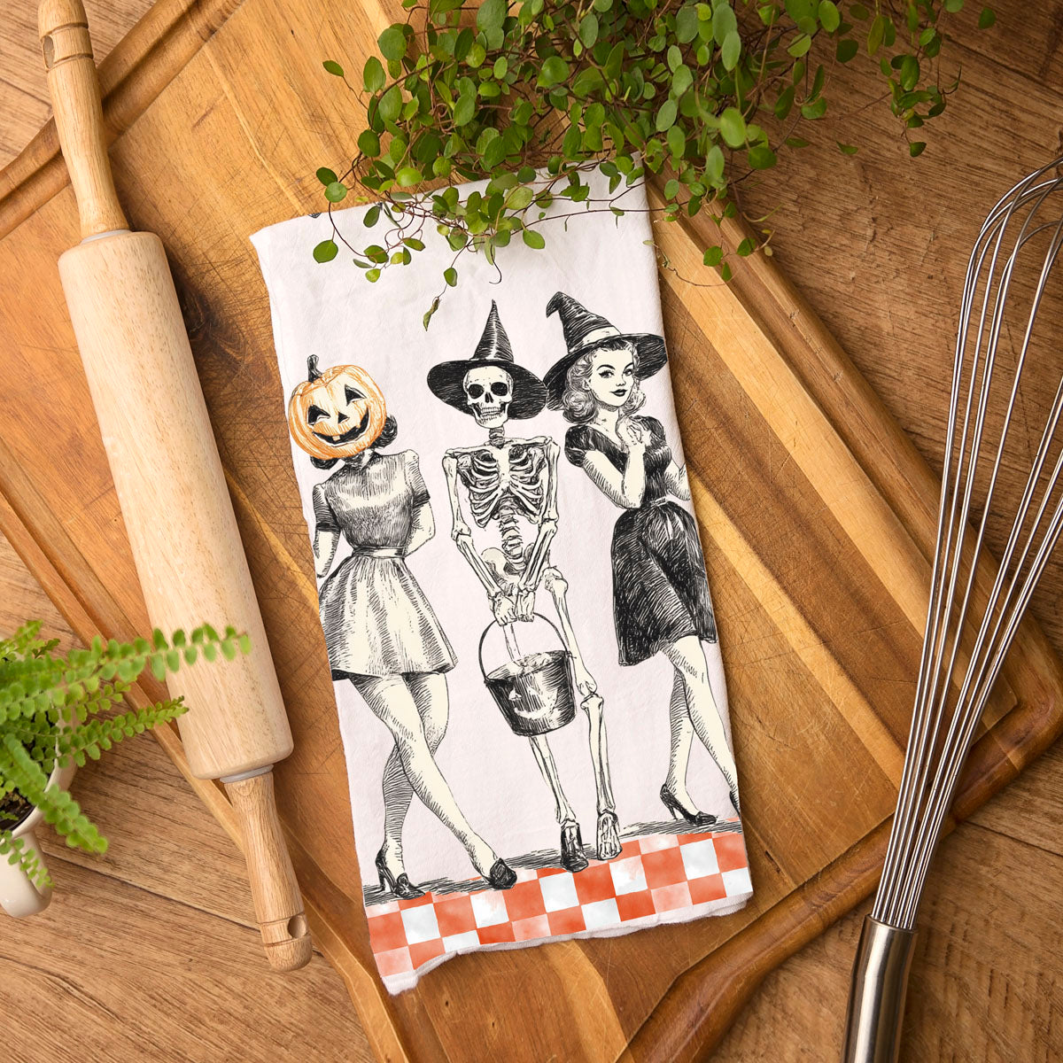 vintage halloween ghoul squad kitchen towel
retro pumpkin head woman dish towel for spooky kitchen
skeleton and witch vintage halloween tea towel