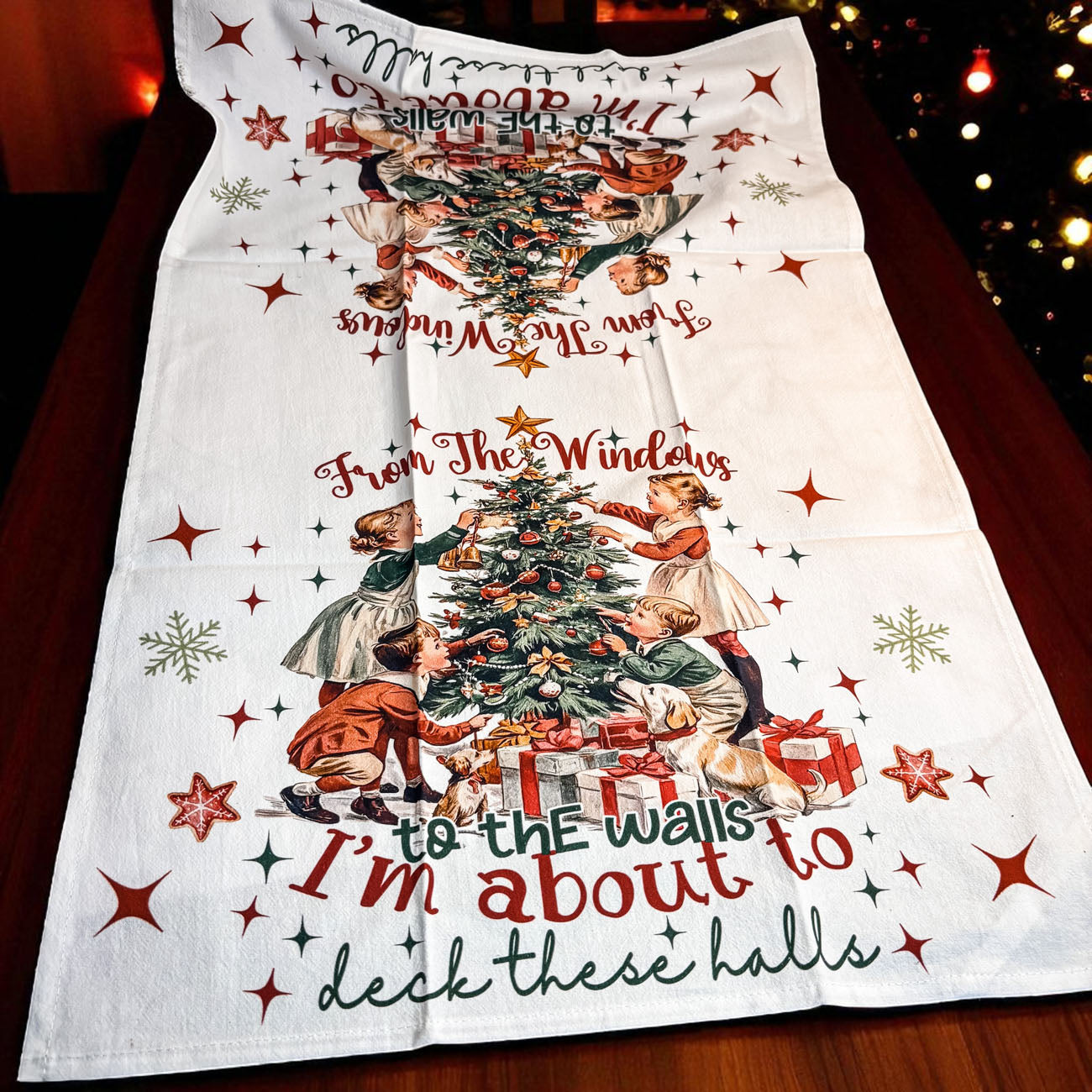 flour sack towel with "deck these halls" christmas quote
vintage christmas decor towel with kids and tree graphic